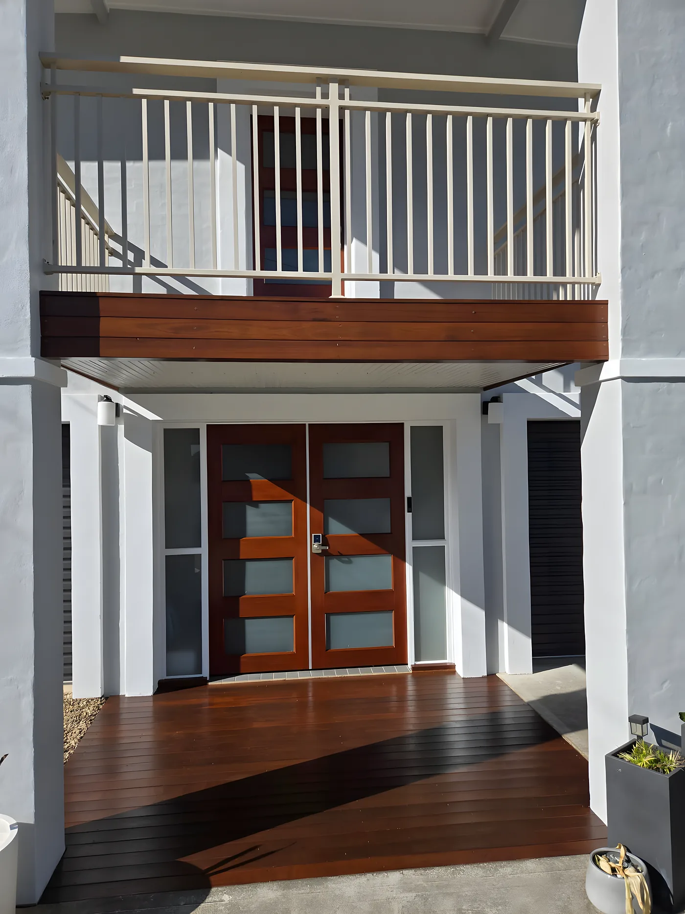 A timber entry with freshly finished doors